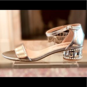 Silver sandals with crystal & pearl covered heel.